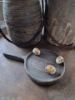 Picture of Houten verweerde onderzetter met handvat