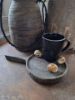 Picture of Houten verweerde onderzetter met handvat